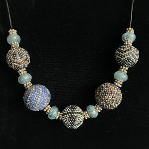 Unique beaded bead necklace with kyanite and sterling beads.